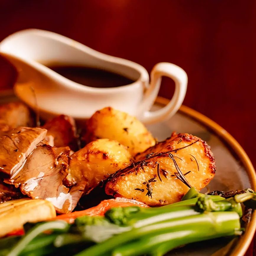 Bottomless Roast Potatoes and Unlimited Gravy at this pub in Swansea