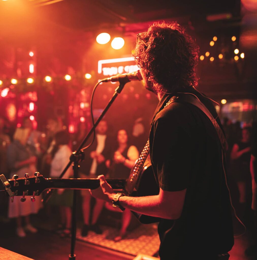 Entertainment options Cardiff Christmas Party at Bonnie Rogues.  Image of live music Christmas performance at Bonnie Rogues Cardiff.