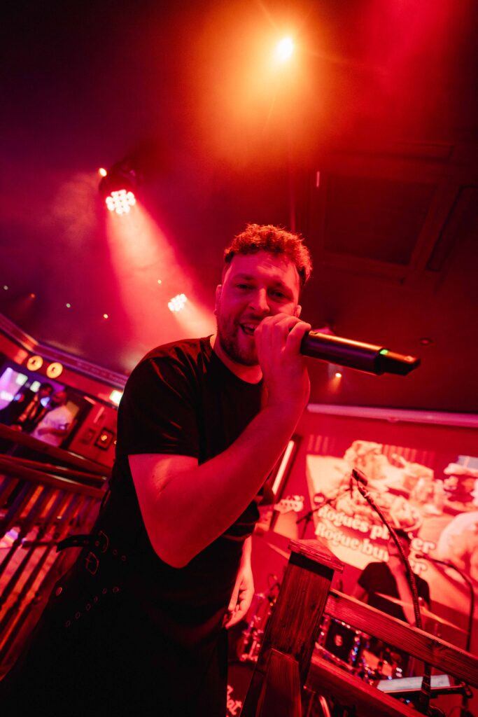 Band on stage with microphone